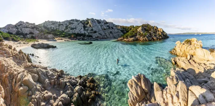 Framed Print : Woman bathing at Cala Napoletana at Caprera Island, La Maddalena Archipelago, Sardinia Framed Print : Woman bathing at Cala Napoletana at Caprera Island, La Maddalena Archipelago, Sardinia