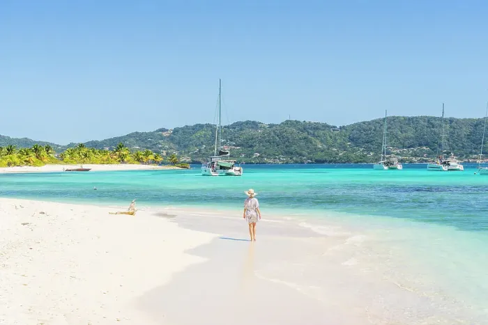 Framed Print : A woman on a beach on Sandy Island, Carriacou, Greneda, caribbean. MR Framed Print : A woman on a beach on Sandy Island, Carriacou, Greneda, caribbean. MR