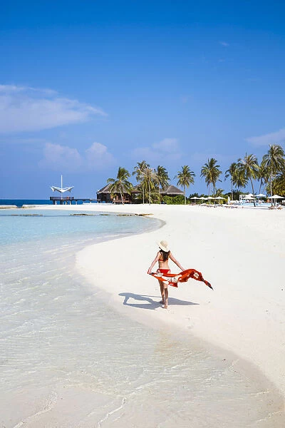 Woman on a beautiful sandy beach, Maldives (MR)