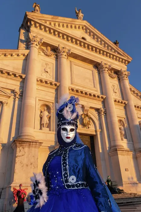 Framed Print : A woman in a blue costume stands in front of San Giorgio Maggiore during the Vencie Carnival, Venice, Italy Framed Print : A woman in a blue costume stands in front of San Giorgio Maggiore during the Vencie Carnival, Venice, Italy