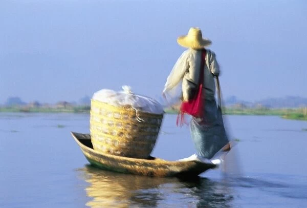 Woman on boat, Lake Inle, Burma