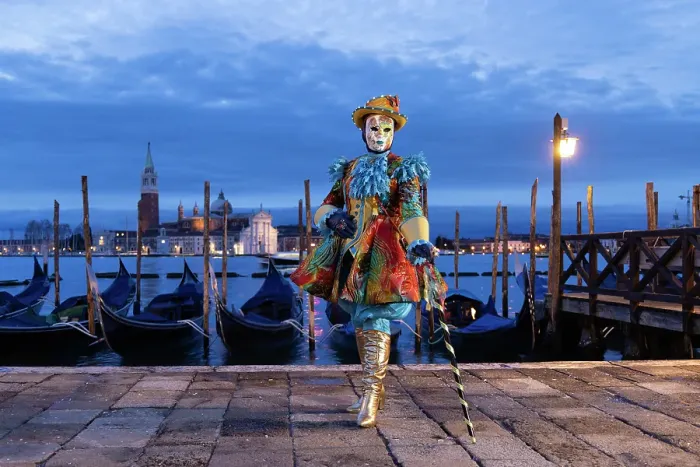 Framed Print : A woman in a colourful costume stands in front of the lagoon during the Venice Carnival, Venice, Italy Framed Print : A woman in a colourful costume stands in front of the lagoon during the Venice Carnival, Venice, Italy