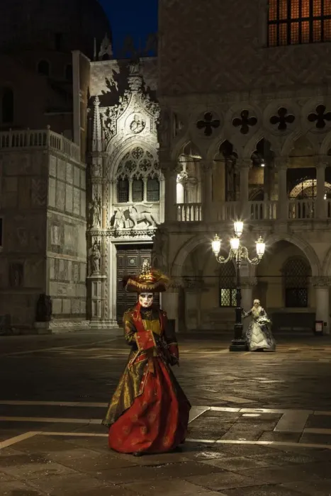 Framed Print : A woman in costume poses in St. Marks square during the Venice Carnival, Venice