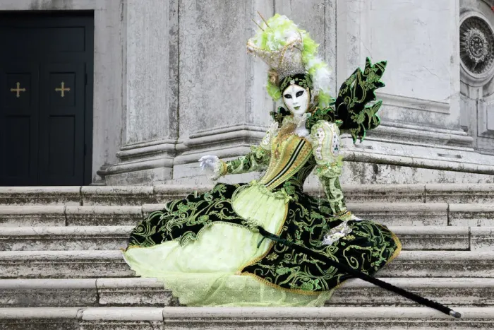 Framed Print : Woman in green costume at Carnival time sitting on steps at Salute, Venice, Veneto, Italy Framed Print : Woman in green costume at Carnival time sitting on steps at Salute, Venice, Veneto, Italy