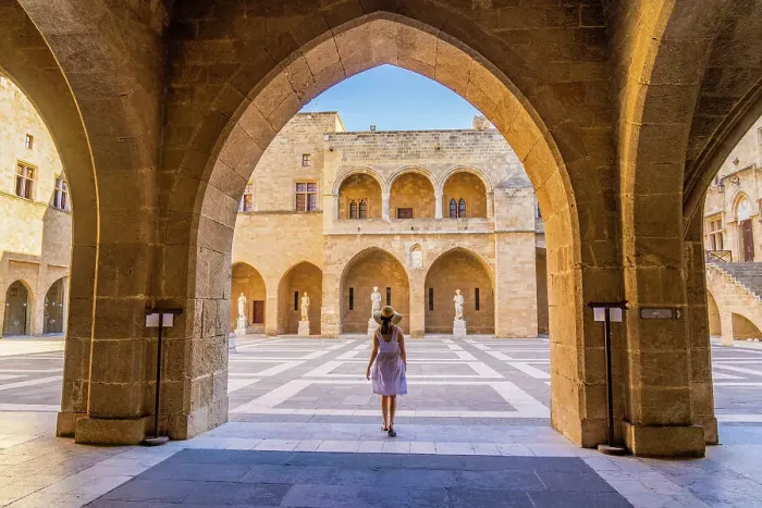 Framed Print : A woman in a hat walking in the Palace of the Grand Master of the Knights of Rhodes, in the Medieval City of Rhodes, UNESCO, Rhodes, Dodecanese Islands, Greece. (MR) Framed Print : A woman in a hat walking in the Palace of the Grand Master of the Knights of Rhodes, in the Medieval City of Rhodes, UNESCO, Rhodes, Dodecanese Islands, Greece. (MR)