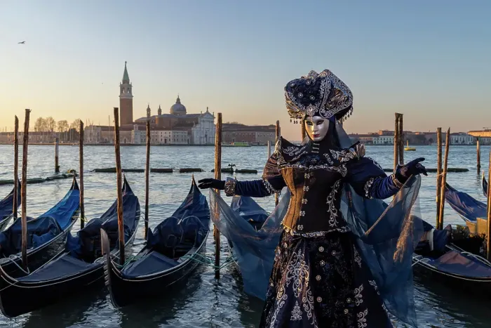 Framed Print : A woman poses in costume in front of the lagoon during the Venice Carnival, Venice, Italy Framed Print : A woman poses in costume in front of the lagoon during the Venice Carnival, Venice, Italy