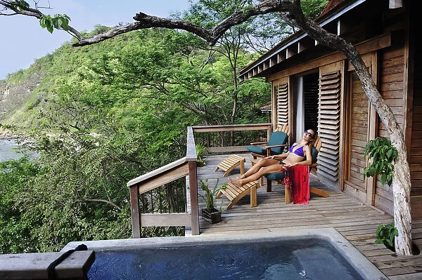 Woman relaxing at Aqua Wellness Resort, Nicaragua, Central America
