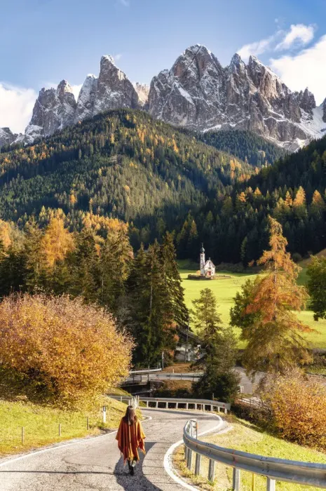 Framed Print : Woman on the road to Santa Maddalena Church. Autumn landscape scenics Framed Print : Woman on the road to Santa Maddalena Church. Autumn landscape scenics