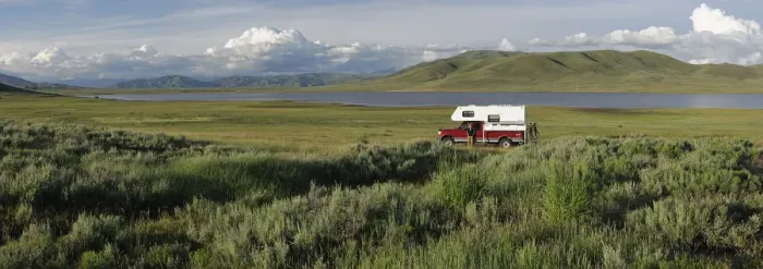 Framed Print : Woman standing next to her pick up camper, Little Camas Prarie Reservoir, Boise National Framed Print : Woman standing next to her pick up camper, Little Camas Prarie Reservoir, Boise National