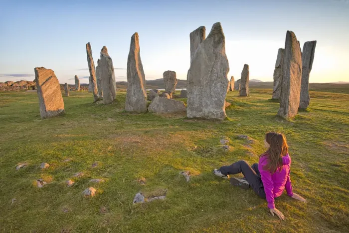 Framed Print : Woman staring at Neolithic stone circle, Callanish, Isle of Lewis, western scotland Framed Print : Woman staring at Neolithic stone circle, Callanish, Isle of Lewis, western scotland
