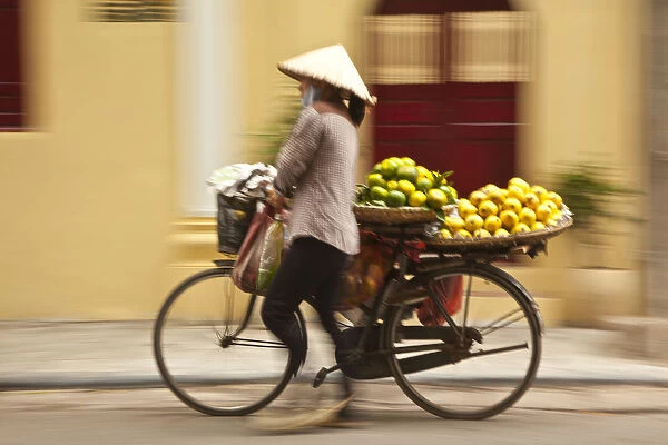 Woman street vendor, Old Quarter, Hanoi, Vietnam