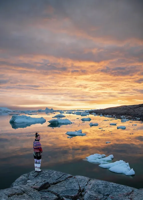 Framed Print : Woman at sunset in traditional Greenlandic costune at Oqaatsut, Greenland Framed Print : Woman at sunset in traditional Greenlandic costune at Oqaatsut, Greenland