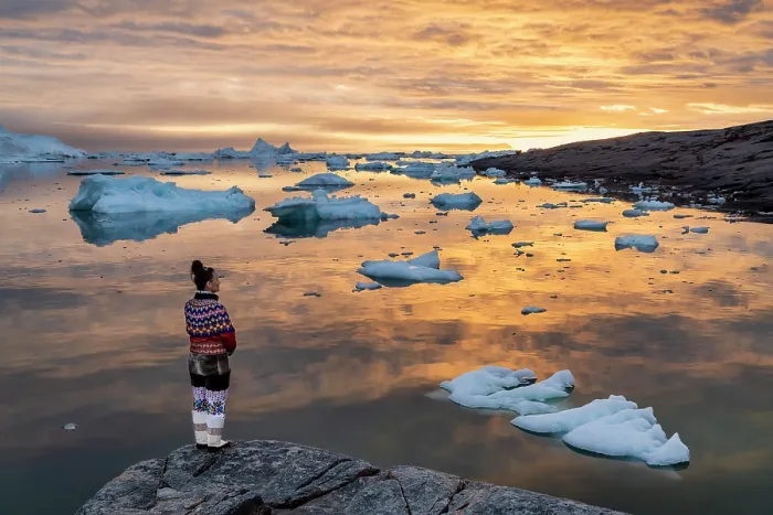 Framed Print : Woman at sunset in traditional Greenlandic costune at Oqaatsut, Greenland Framed Print : Woman at sunset in traditional Greenlandic costune at Oqaatsut, Greenland
