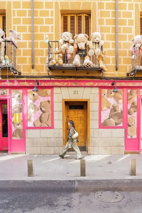 Framed Print : A woman walking in Calle de la Cava Baja, Madrid, Spain