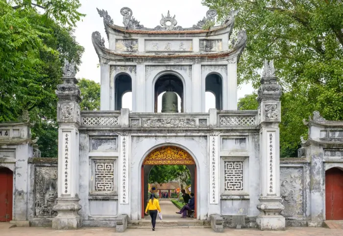 Framed Print : Woman walking through gate at Temple of Literature, Dong Da District, Hanoi, Vietnam Framed Print : Woman walking through gate at Temple of Literature, Dong Da District, Hanoi, Vietnam
