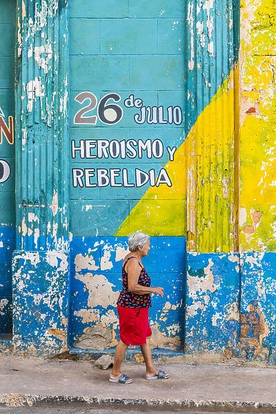 Woman walking in La Habana Vieja (Old Town), Havana, Cuba