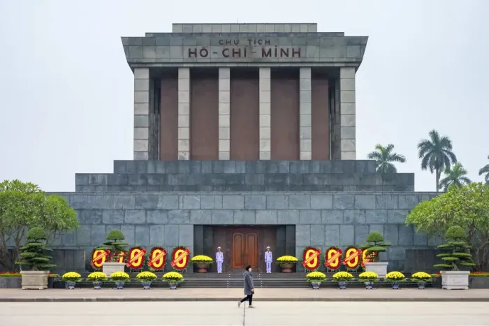 Framed Print : A woman walks past Ho Chi Minh Mausoleum on Ba Dinh Square, Hanoi, Vietnam Framed Print : A woman walks past Ho Chi Minh Mausoleum on Ba Dinh Square, Hanoi, Vietnam