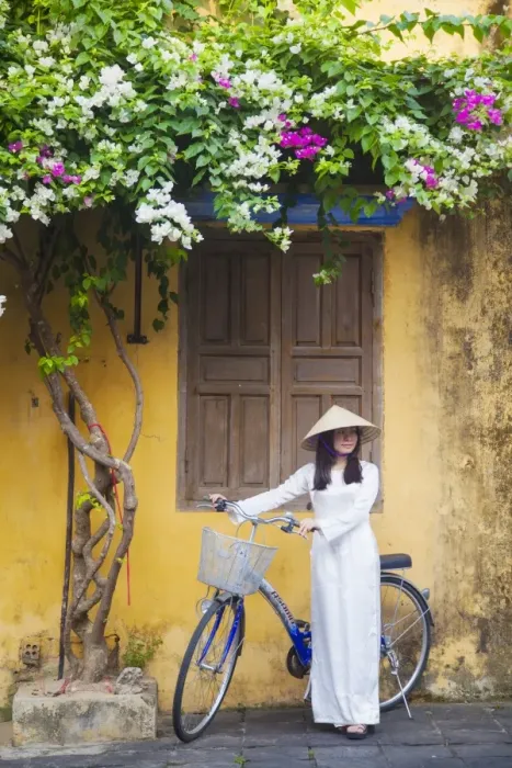 Framed Print : Woman wearing Ao Dai dress with bicycle, Hoi An (UNESCO World Heritage Site), Quang Ham Framed Print : Woman wearing Ao Dai dress with bicycle, Hoi An (UNESCO World Heritage Site), Quang Ham