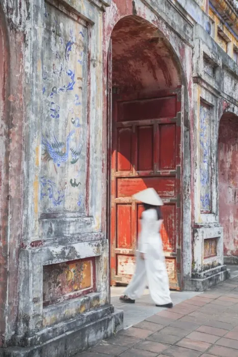 Framed Print : Woman wearing Ao Dai dress at Dien Tho inside Citadel, Hue, Thua Thien-Hue, Vietnam (MR)
