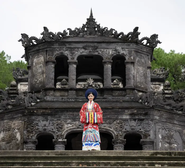 Framed Print : Woman wearing traditional Naht Binh robe at the tomb of Emperor Khai Dinh, Hue, Central Vietnam, Asia Framed Print : Woman wearing traditional Naht Binh robe at the tomb of Emperor Khai Dinh, Hue, Central Vietnam, Asia