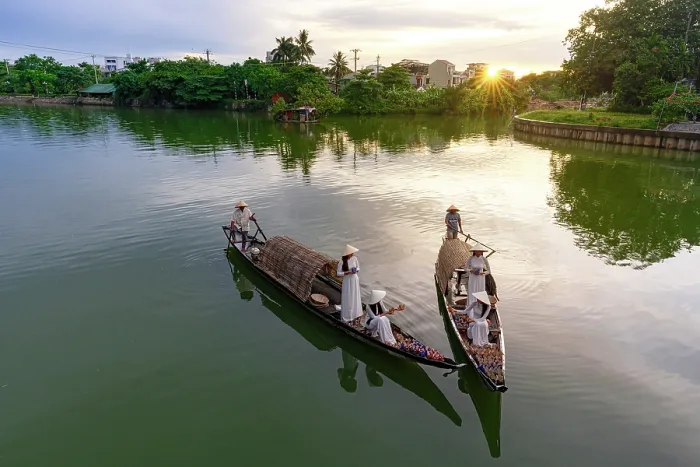 Framed Print : Women on boats with traditional paper lanterns, Nhu Y River, Hue, Central Vietnam. (MR)