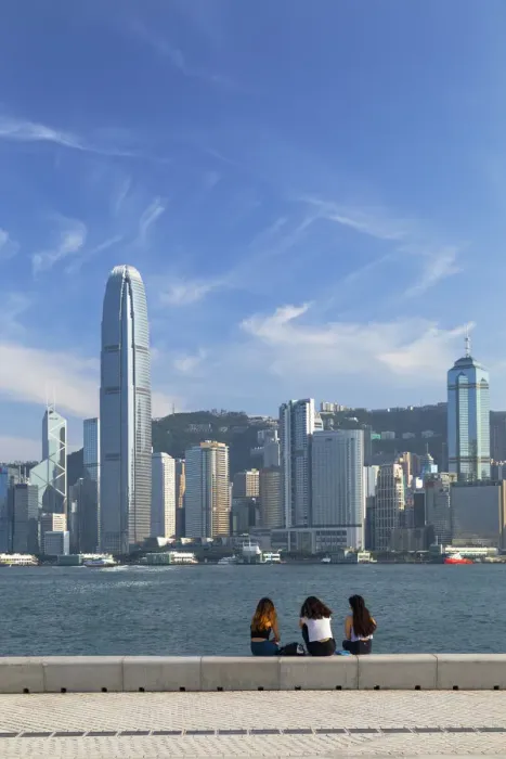 Framed Print : Women sitting in West Kowloon Art Park, Kowloon, Hong Kong