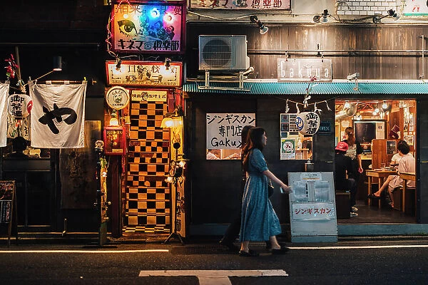 Women walking in the bohemian district of Shimokitazawa, Tokyo, Japan