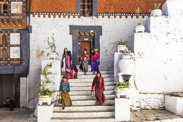 Women walking in Trongsa Dzong, Trongsa District, Bhutan
