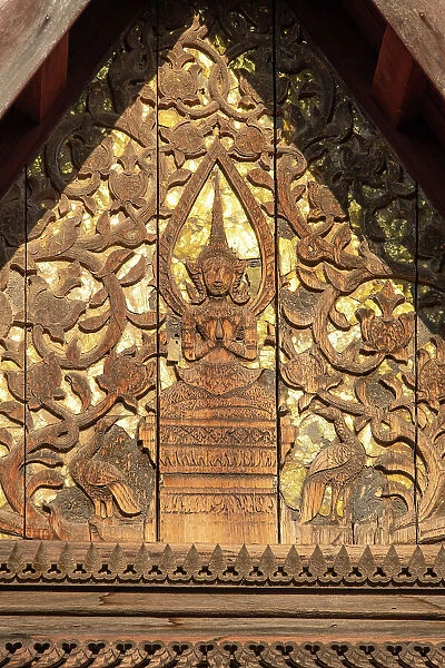 Detail of wood carving on Wat Sisaket, Vientiane (capital city), Laos