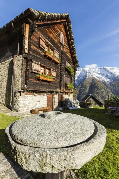 Framed Print : Wood facade of walser house with the Alps in background, Salecchio, Val Formazza Framed Print : Wood facade of walser house with the Alps in background, Salecchio, Val Formazza