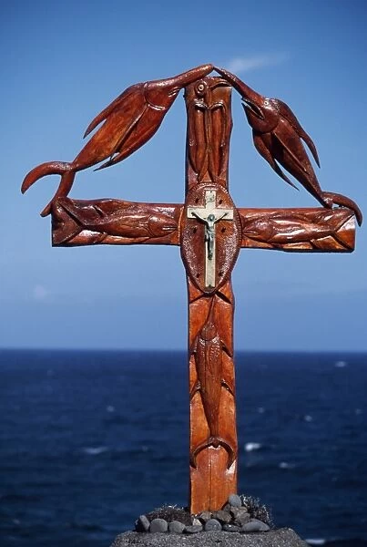 Wooden cross on erected on the southern coast combining