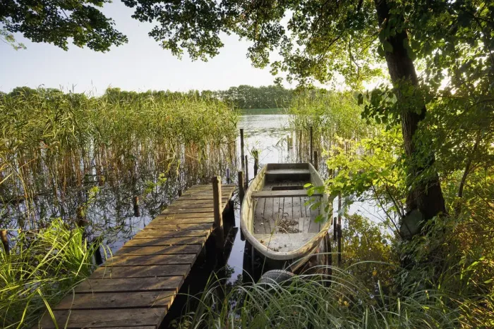 Framed Print : Wooden jetty with rowing boat on Netzowsee, Templiner Gewaesser Framed Print : Wooden jetty with rowing boat on Netzowsee, Templiner Gewaesser