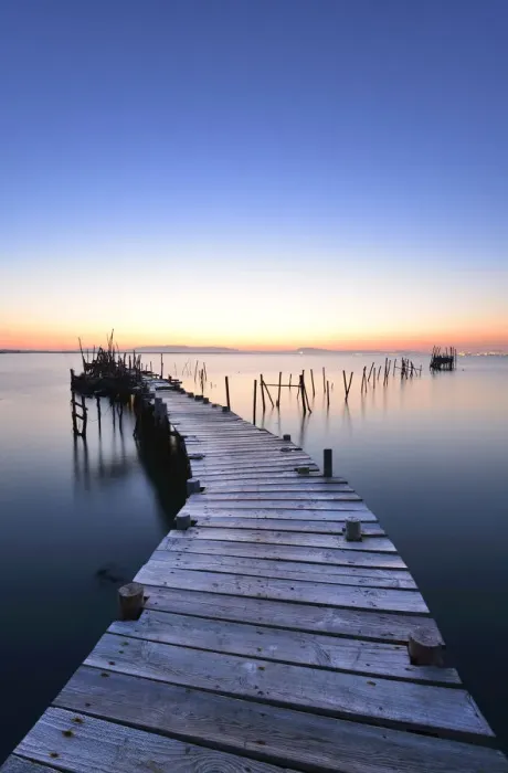 Framed Print : Wooden pillars piers, a palafite fishing harbour of Carrasqueira at dusk. Alentejo Framed Print : Wooden pillars piers, a palafite fishing harbour of Carrasqueira at dusk. Alentejo