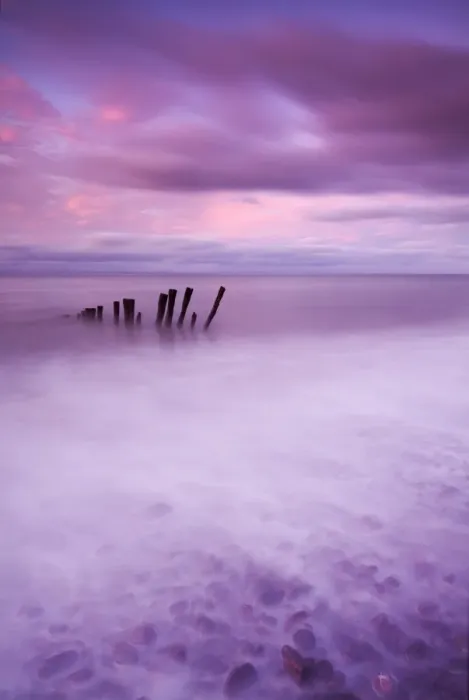 Framed Print : Wooden posts at high tide on Porlock Beach, Exmoor, Somerset Framed Print : Wooden posts at high tide on Porlock Beach, Exmoor, Somerset