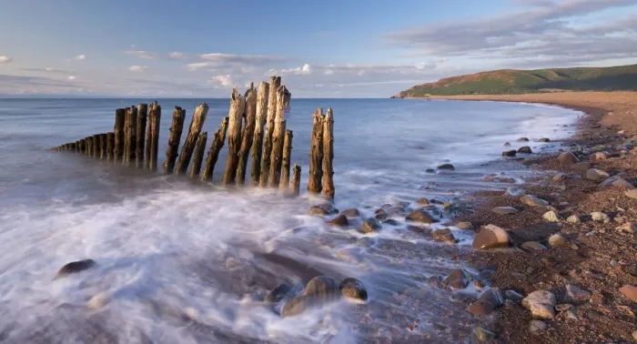 Framed Print : Wooden sea defences at Porlock Bay in Exmoor National Park, Somerset, England. Summer