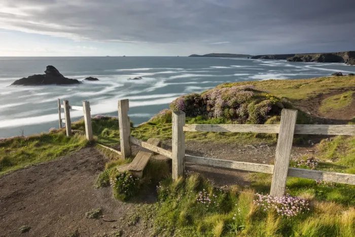 Framed Print : Wooden stile on the South West Coast Path long distance footpath near Porthcothan Bay Framed Print : Wooden stile on the South West Coast Path long distance footpath near Porthcothan Bay