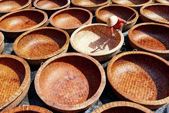 Framed Print : Worker making bamboo basket boats, Tuy An, Phu Yen province, Vietnam. (MR) Framed Print : Worker making bamboo basket boats, Tuy An, Phu Yen province, Vietnam. (MR)