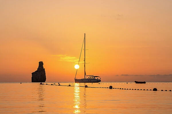 Yacht with sunset, Ibiza, Spain