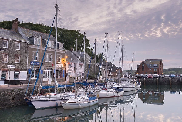 Yachts moored in Padstow harbour at dawn, Padstow, North Cornwall, England