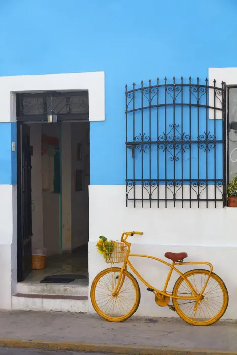Framed Print : A yellow bike in front of a colorful shop in Merida, Yucatan, Mexico Framed Print : A yellow bike in front of a colorful shop in Merida, Yucatan, Mexico