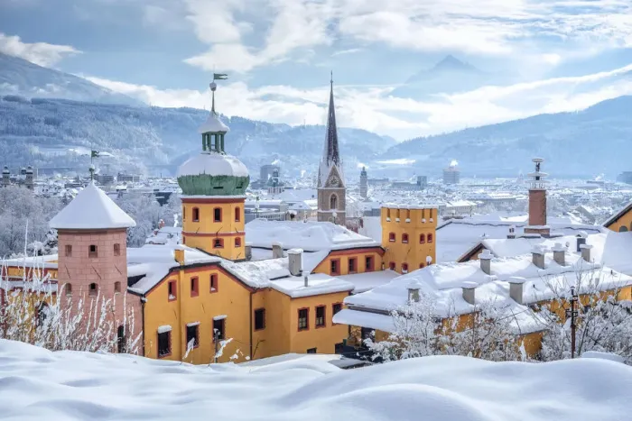 Framed Print : The yellow Buechsenhausen Castle after the snowfall, Sankt Nikolaus district