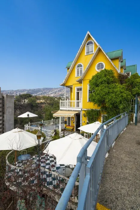 Framed Print : Yellow Hotel Brighton with parasols, UNESCO, Paseo Atkinson, Cerro Alegre, Valparaiso, Valparaiso Province, Valparaiso Region, Chile Framed Print : Yellow Hotel Brighton with parasols, UNESCO, Paseo Atkinson, Cerro Alegre, Valparaiso, Valparaiso Province, Valparaiso Region, Chile