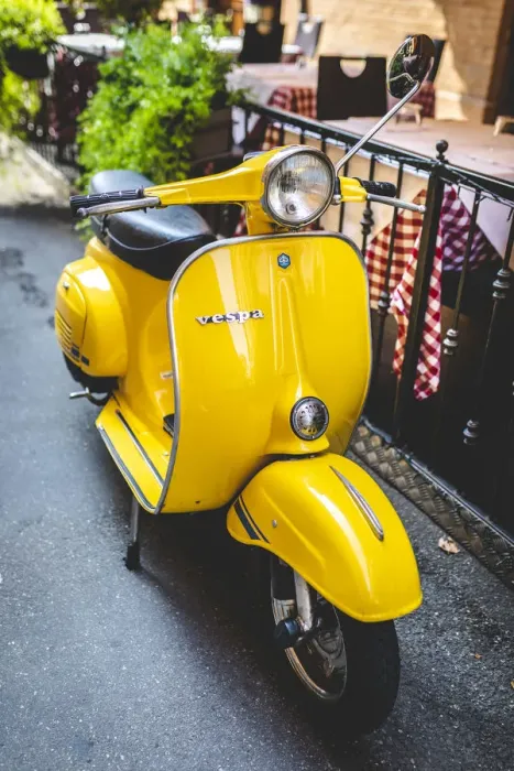 Framed Print : Yellow Vespa in Modena historic city. Modena old town, Emilia Romagna, Italy Framed Print : Yellow Vespa in Modena historic city. Modena old town, Emilia Romagna, Italy