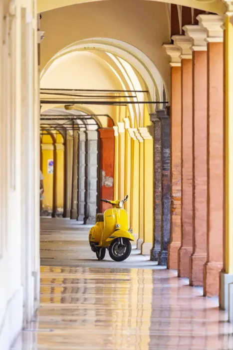 Framed Print : Yellow Vespa in Modena historic city. Modena old town, Emilia Romagna, Italy Framed Print : Yellow Vespa in Modena historic city. Modena old town, Emilia Romagna, Italy