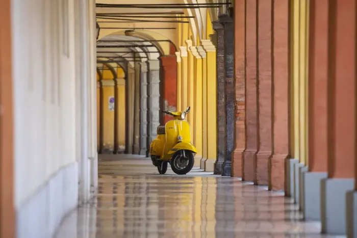 Framed Print : Yellow Vespa in Modena historic city. Modena old town, Emilia Romagna, Italy Framed Print : Yellow Vespa in Modena historic city. Modena old town, Emilia Romagna, Italy