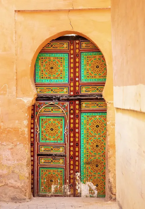 Framed Print : Yellow wall and brightly painted wooden door, Meknes, Morocco Framed Print : Yellow wall and brightly painted wooden door, Meknes, Morocco