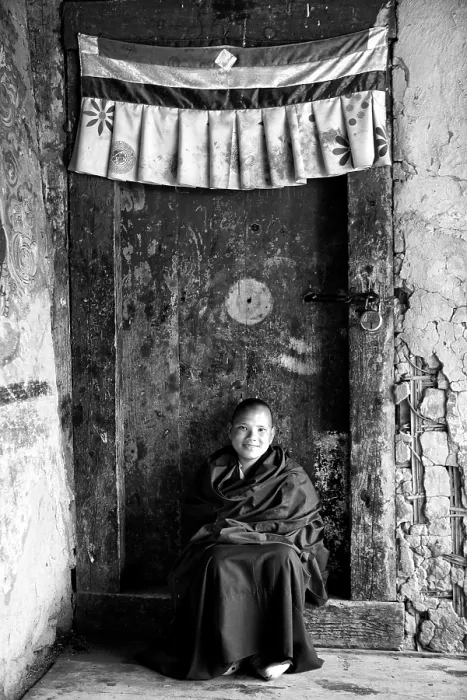 Framed Print : Young Buddhist monk sat on doorstep, near Jakar, Bumthang, Bhutan, Asia Framed Print : Young Buddhist monk sat on doorstep, near Jakar, Bumthang, Bhutan, Asia