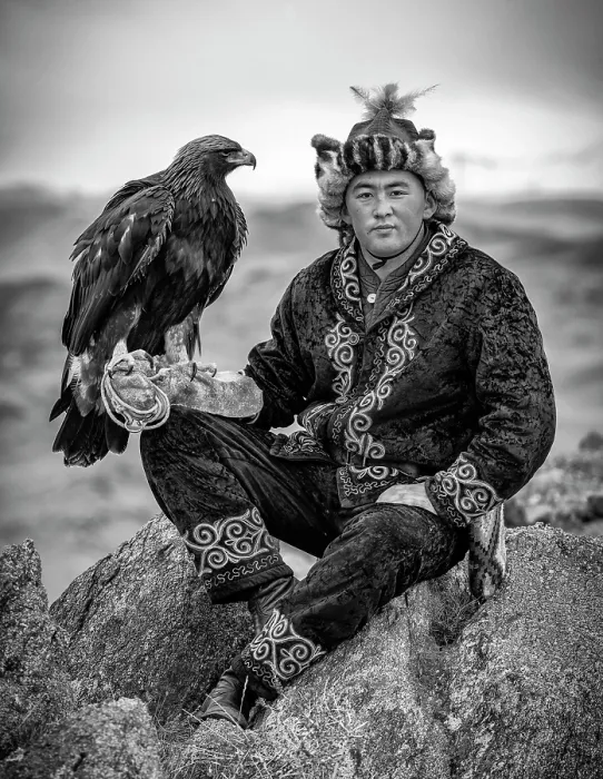 Framed Print : Young Kazakh Eagle Hunter posing with his Golden Eagle, Altai Mountains, Western Mongolia, Asia Framed Print : Young Kazakh Eagle Hunter posing with his Golden Eagle, Altai Mountains, Western Mongolia, Asia