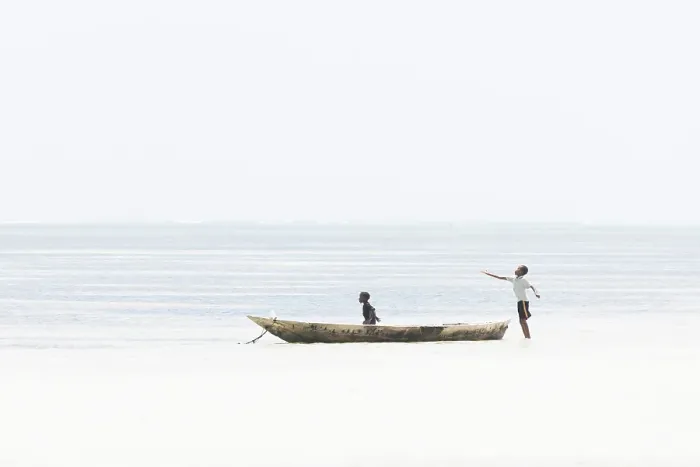 Framed Print : Young local boys playing in a dugout canoe, Zanzibar, Bweju, Tanzania Framed Print : Young local boys playing in a dugout canoe, Zanzibar, Bweju, Tanzania