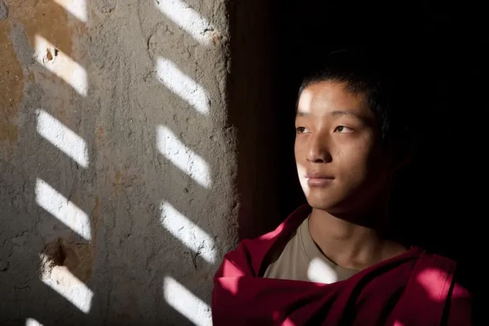 Framed Print : A young monk at the blue palace in Bhutan Framed Print : A young monk at the blue palace in Bhutan